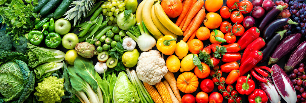 Different foods creating a rainbow palette