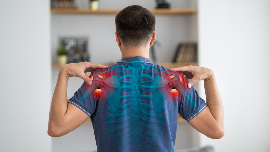 Man experiencing inflamed shoulders from injuries and lack of magnesium